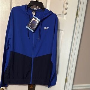 Reebok men’s full zip training hooded jacket with pockets; size: various